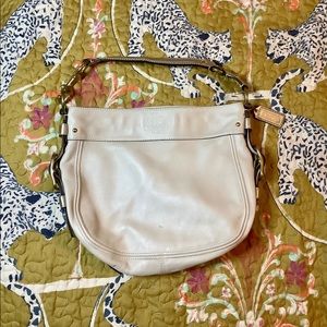 White/gold COACH handbag